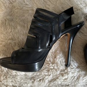 Dior black leather and mesh size 8 heel.